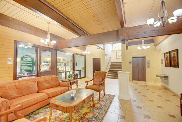 tiled living room featuring beamed ceiling, a chandelier, and elevator