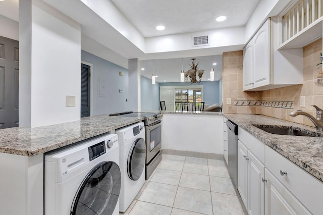 washroom featuring sink and light tile patterned floors