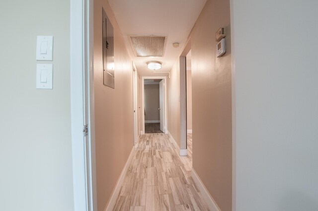 walk in closet featuring wood tiled floor