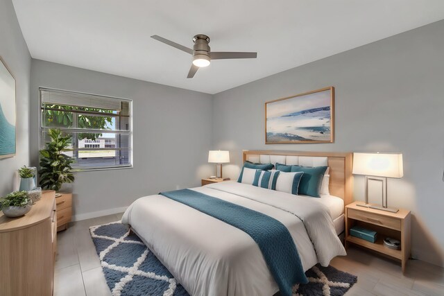 164 Normandy D, Delray Beach, FL 33484 - bedroom with a ceiling fan and baseboards