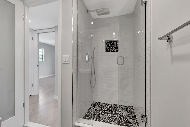 164 Normandy D, Delray Beach, FL 33484 - full bathroom featuring baseboards, tile patterned floors, and a stall shower