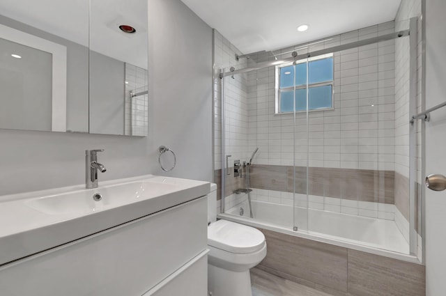 164 Normandy D, Delray Beach, FL 33484 - bathroom featuring toilet, vanity, and tiled shower / bath