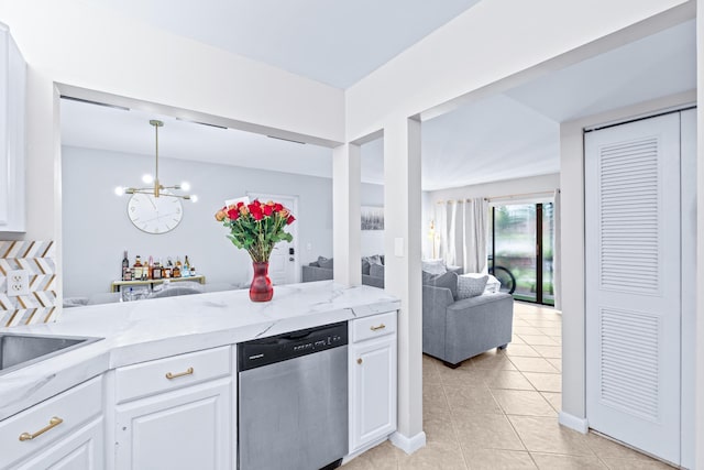 kitchen with hanging light fixtures, dishwasher, an inviting chandelier, and white cabinetry