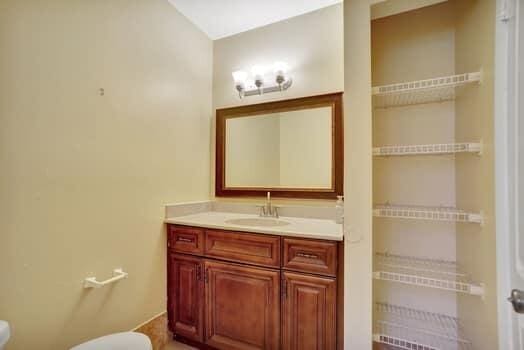 bathroom with vanity and toilet