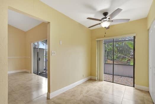 spare room with ceiling fan