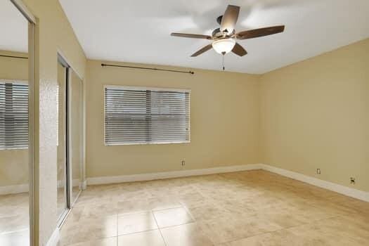 unfurnished bedroom with ceiling fan