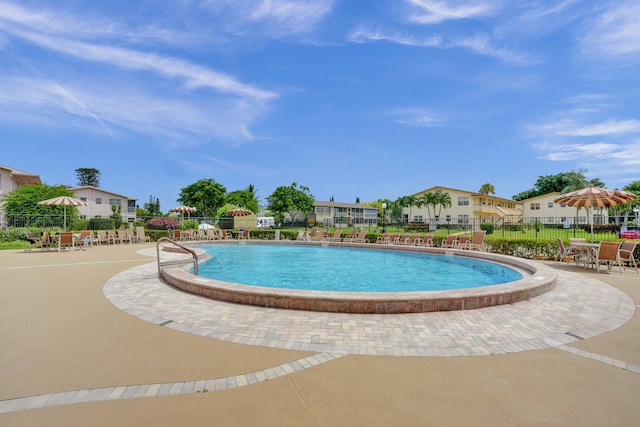 view of swimming pool featuring a patio