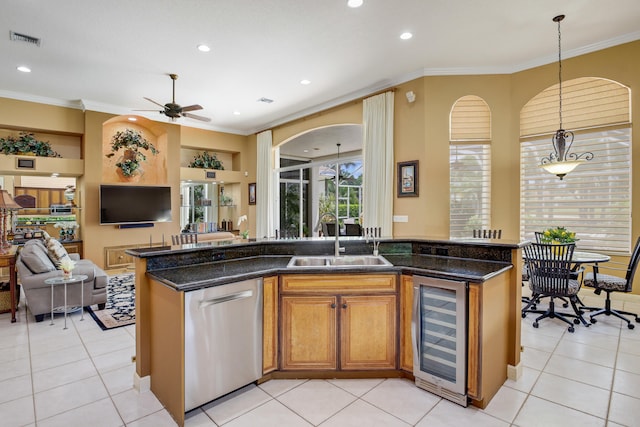 kitchen featuring wine cooler, dark stone countertops, stainless steel dishwasher, hanging light fixtures, and ceiling fan