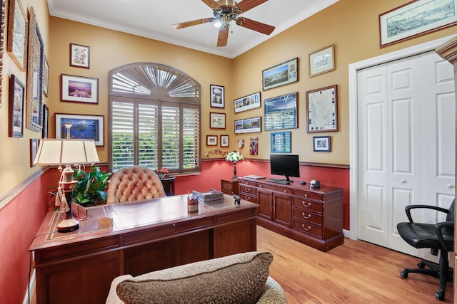 home office featuring ceiling fan, light hardwood / wood-style floors, and ornamental molding