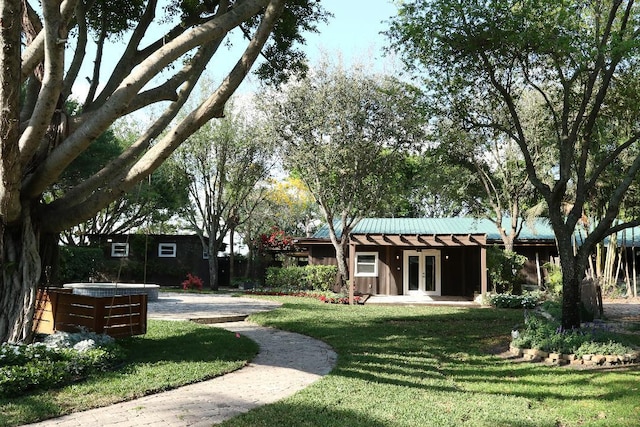 view of yard with french doors