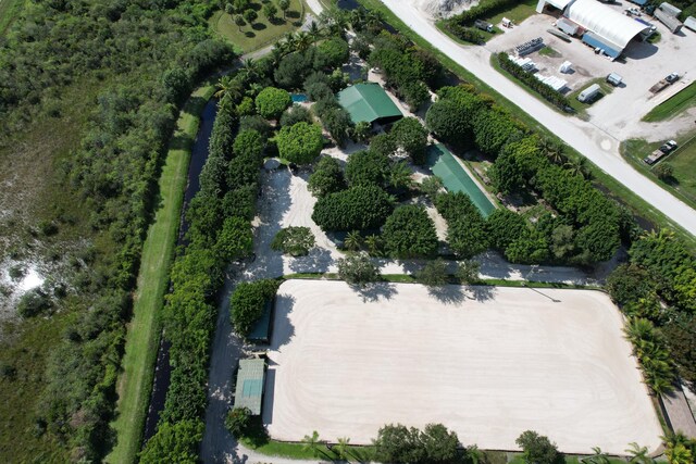 view of community featuring a yard and a rural view