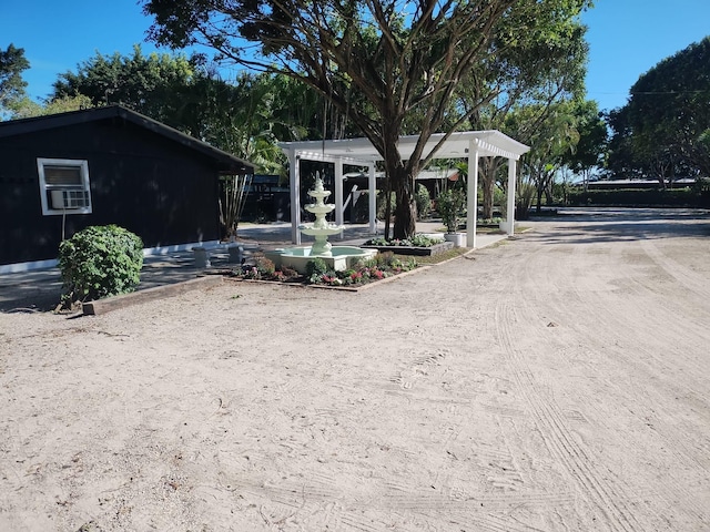 exterior space with a pergola