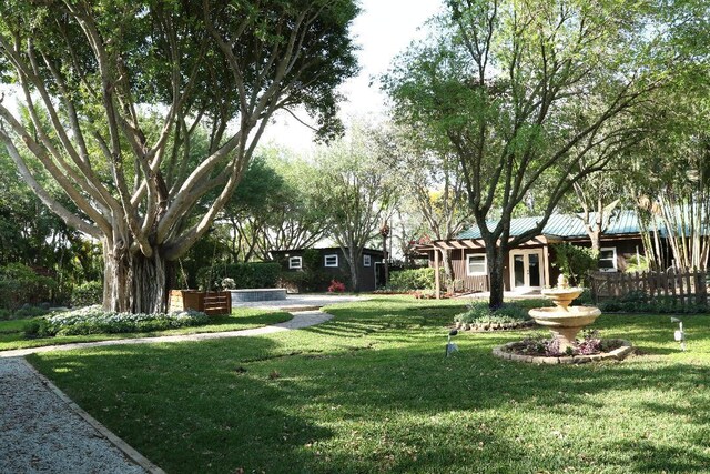 view of yard with french doors