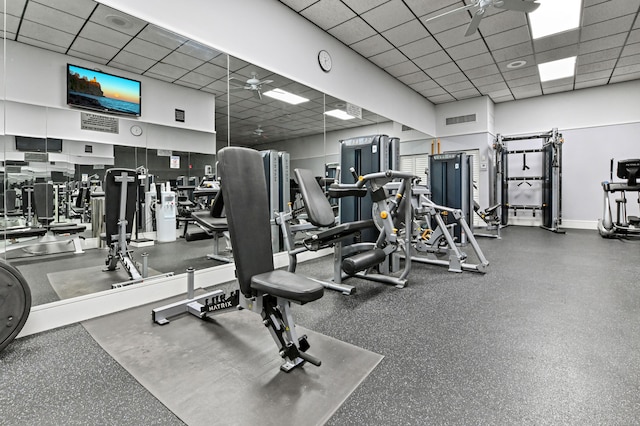 workout area featuring a drop ceiling