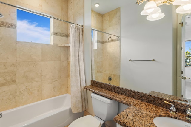 full bathroom featuring vanity, toilet, a wealth of natural light, and shower / bath combo with shower curtain