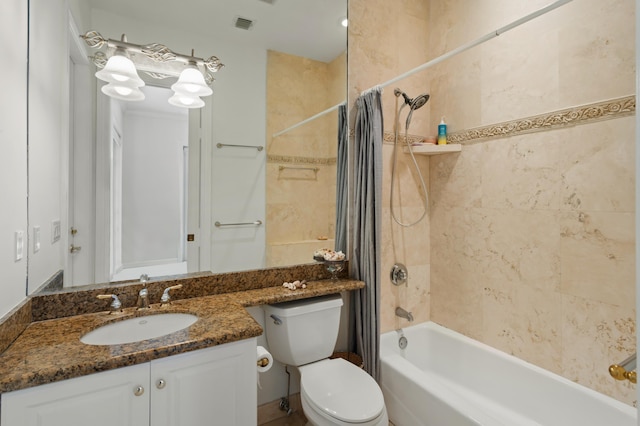 full bathroom featuring vanity, toilet, and shower / tub combo