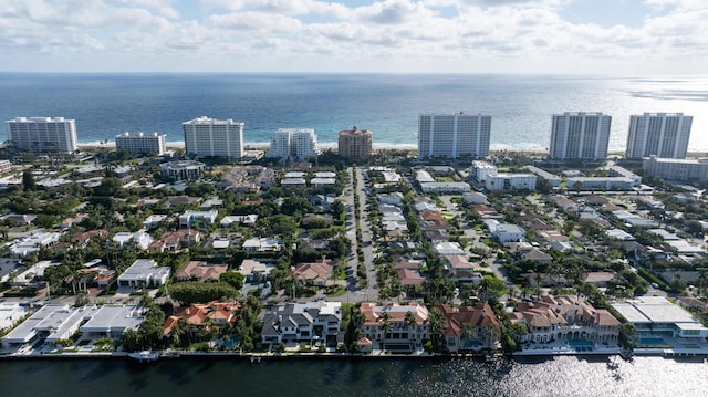 aerial view featuring a view of city and a water view