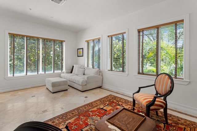 living room with a healthy amount of sunlight