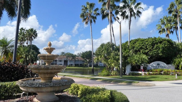 view of home's community with a water view