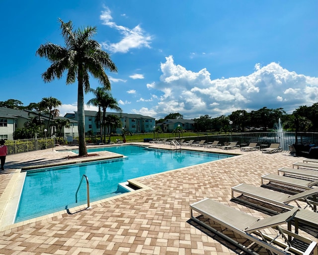 view of pool featuring a patio