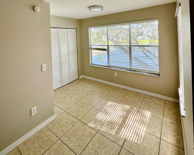 view of tiled empty room