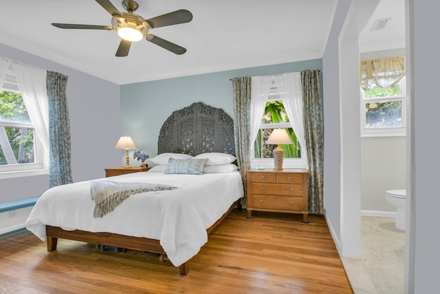 bedroom featuring ceiling fan and light hardwood / wood-style floors