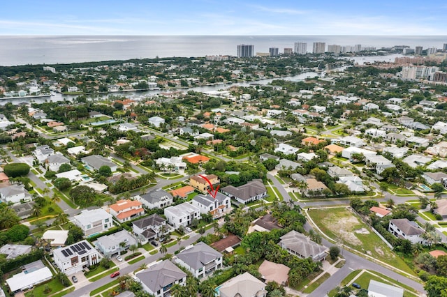 drone / aerial view with a water view