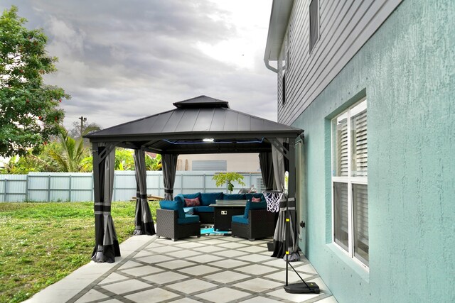 view of patio / terrace with a gazebo and an outdoor hangout area