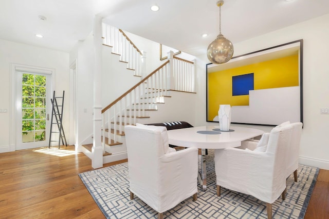 dining area with wood-type flooring