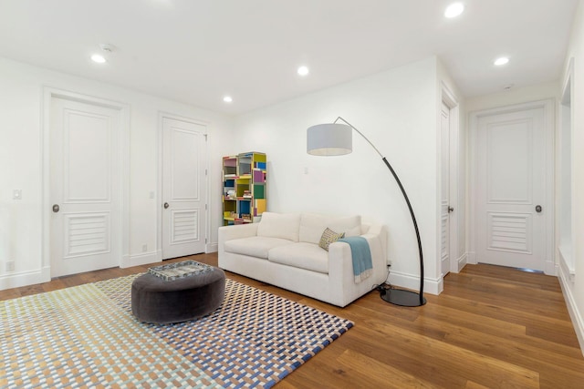 sitting room with hardwood / wood-style floors