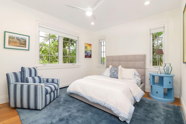 bedroom featuring wood-type flooring and ceiling fan