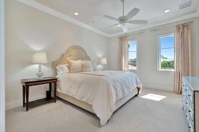 carpeted bedroom featuring ceiling fan and ornamental molding