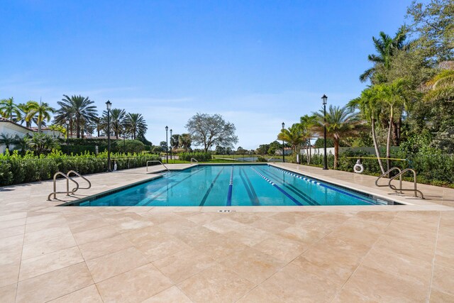 view of pool featuring a patio area