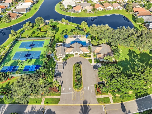 bird's eye view with a water view