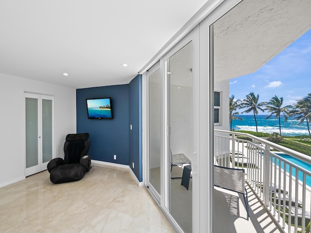 living area featuring french doors