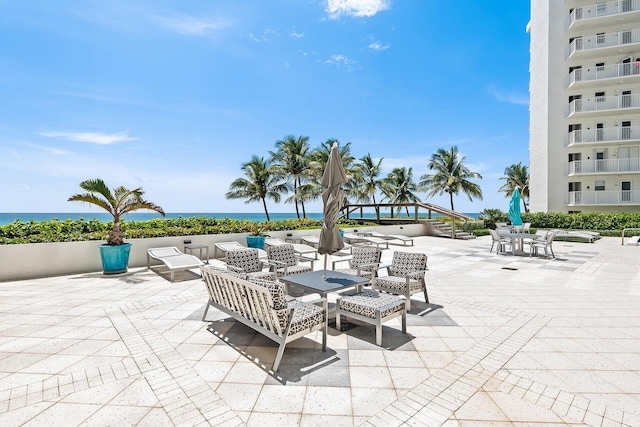 view of patio / terrace with a water view