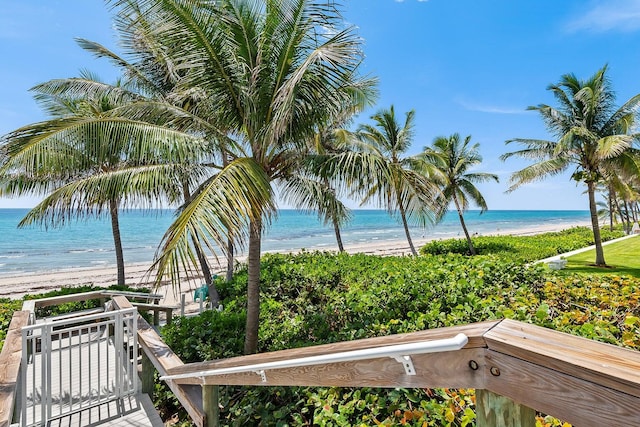 property view of water featuring a beach view