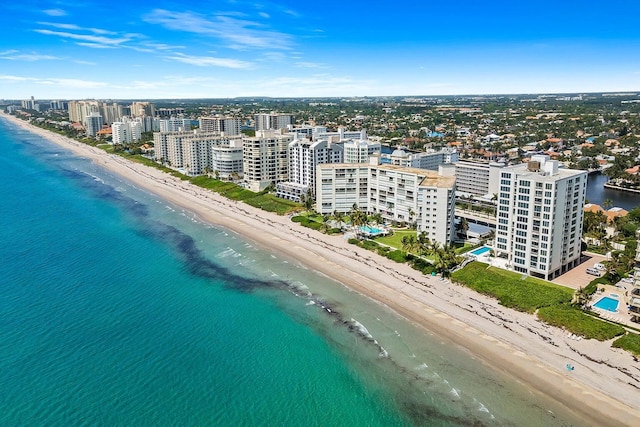 bird's eye view with a view of the beach and a water view