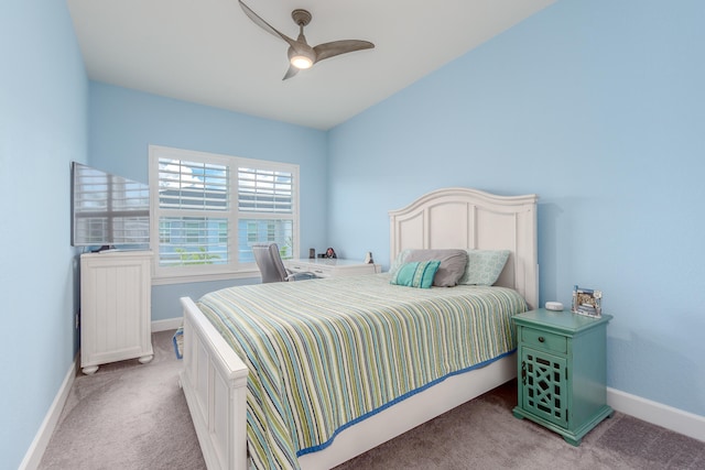 bedroom featuring ceiling fan and light colored carpet