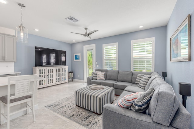 living room with ceiling fan