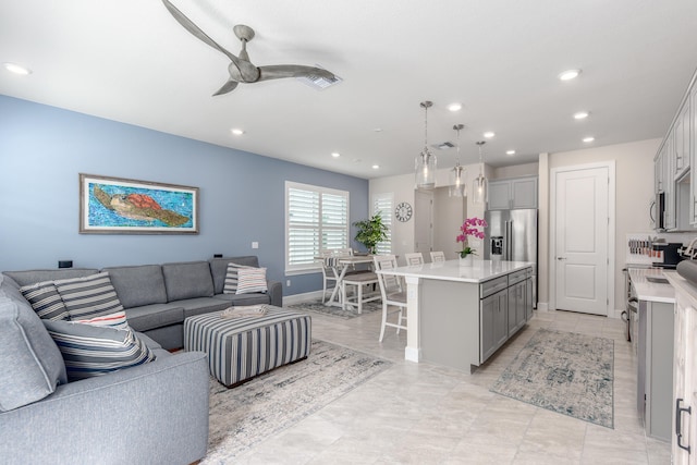 living room featuring ceiling fan