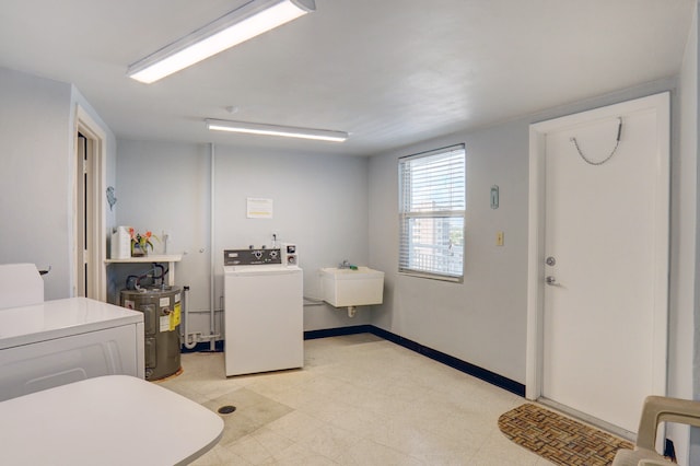 bathroom featuring water heater and sink