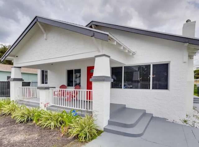 view of front of house featuring covered porch