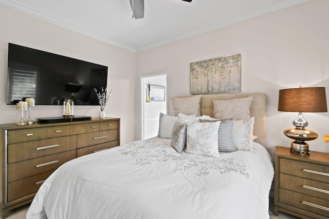 bedroom with ceiling fan and ornamental molding