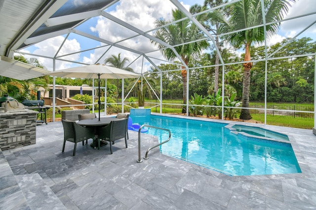 view of swimming pool with glass enclosure and a patio