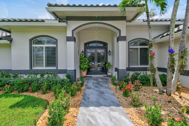 doorway to property featuring french doors