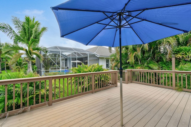 wooden deck with a lanai