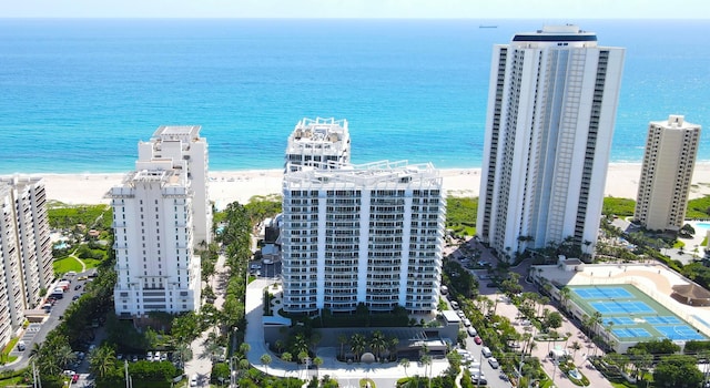 aerial view featuring a water view and a view of the beach