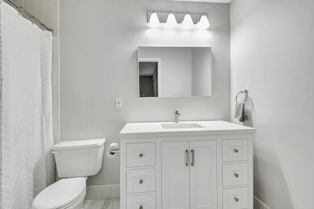 bathroom with tile patterned floors, vanity, toilet, and a shower with curtain