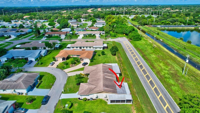 drone / aerial view featuring a water view